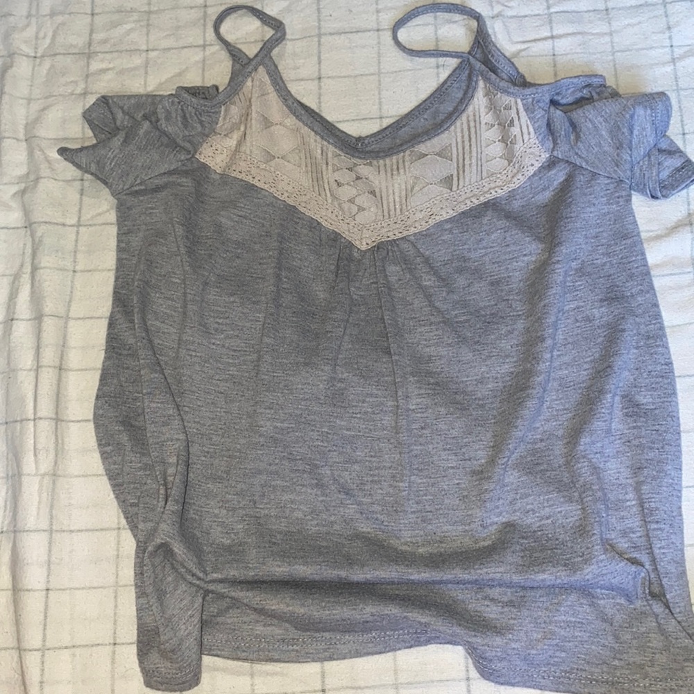 Grey off the shoulder shirt.